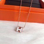 AAA Replica Hermes Rose Gold White Lacquer Cage d'H Pendant Necklace 